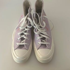 Purple converse high tops